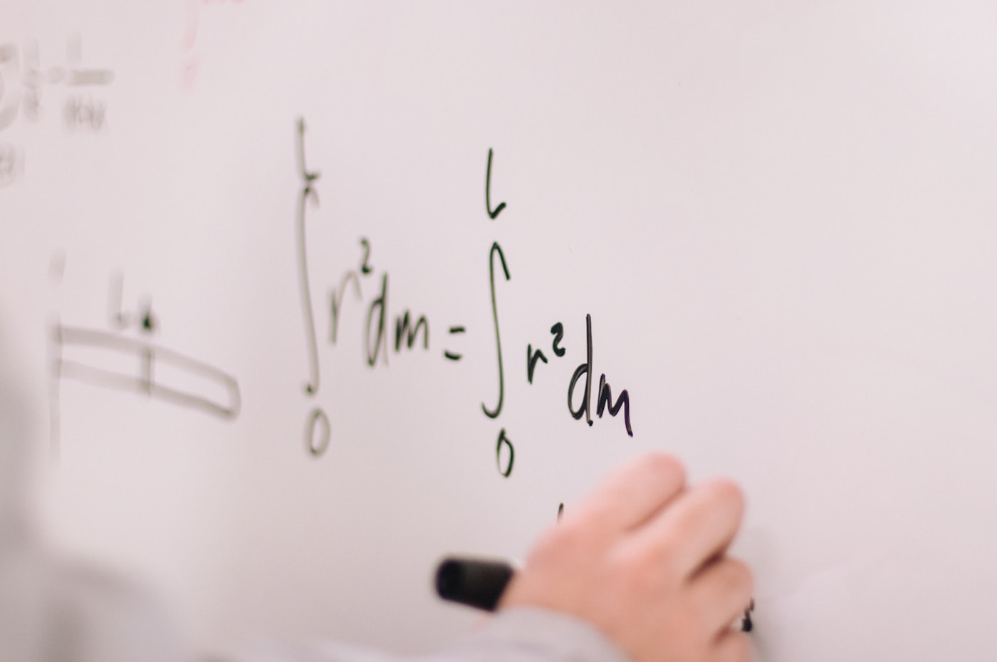 Working through a problem on a whiteboard